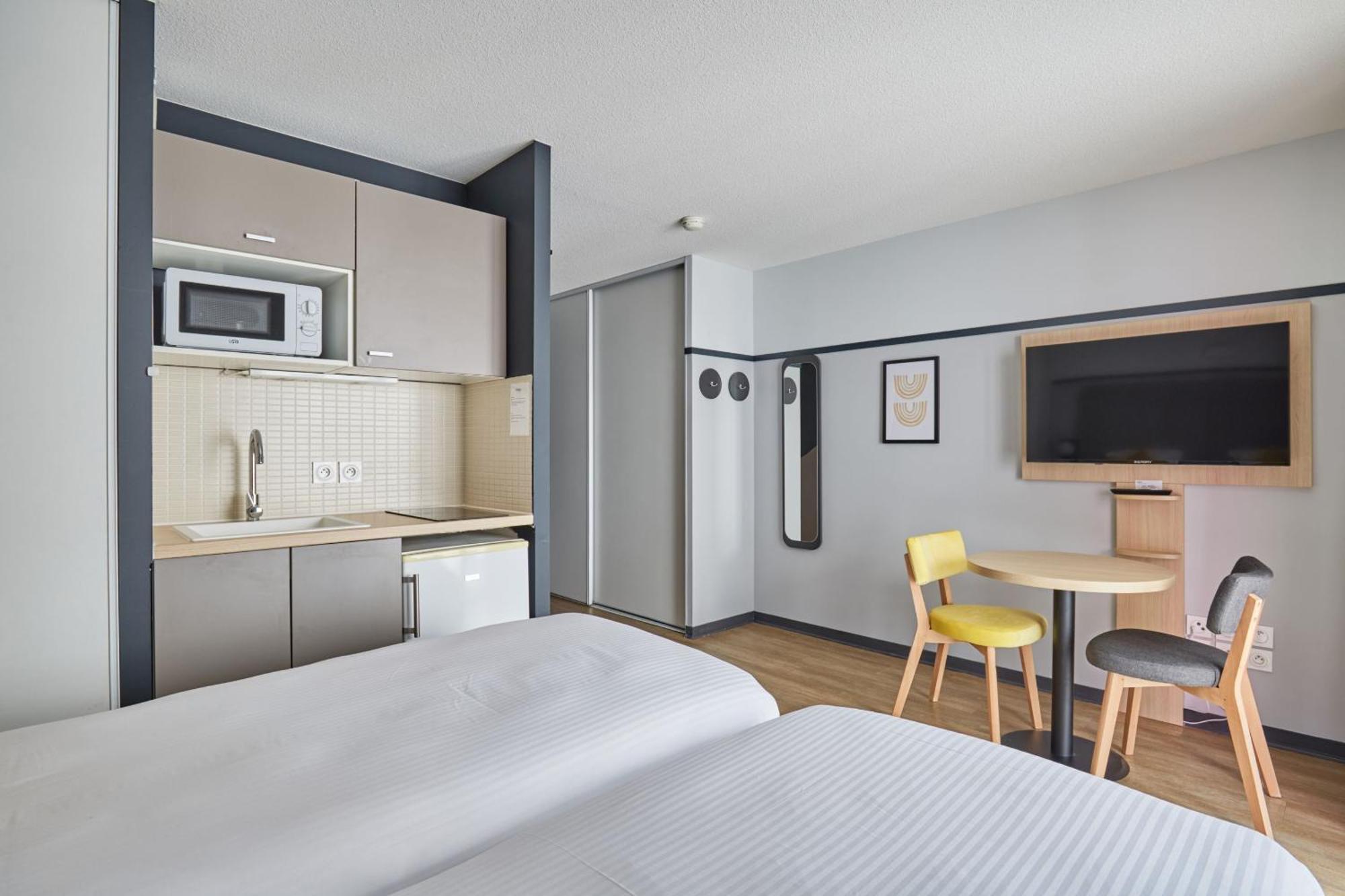 Apartahotel Odalys - Centre Confluence 3*